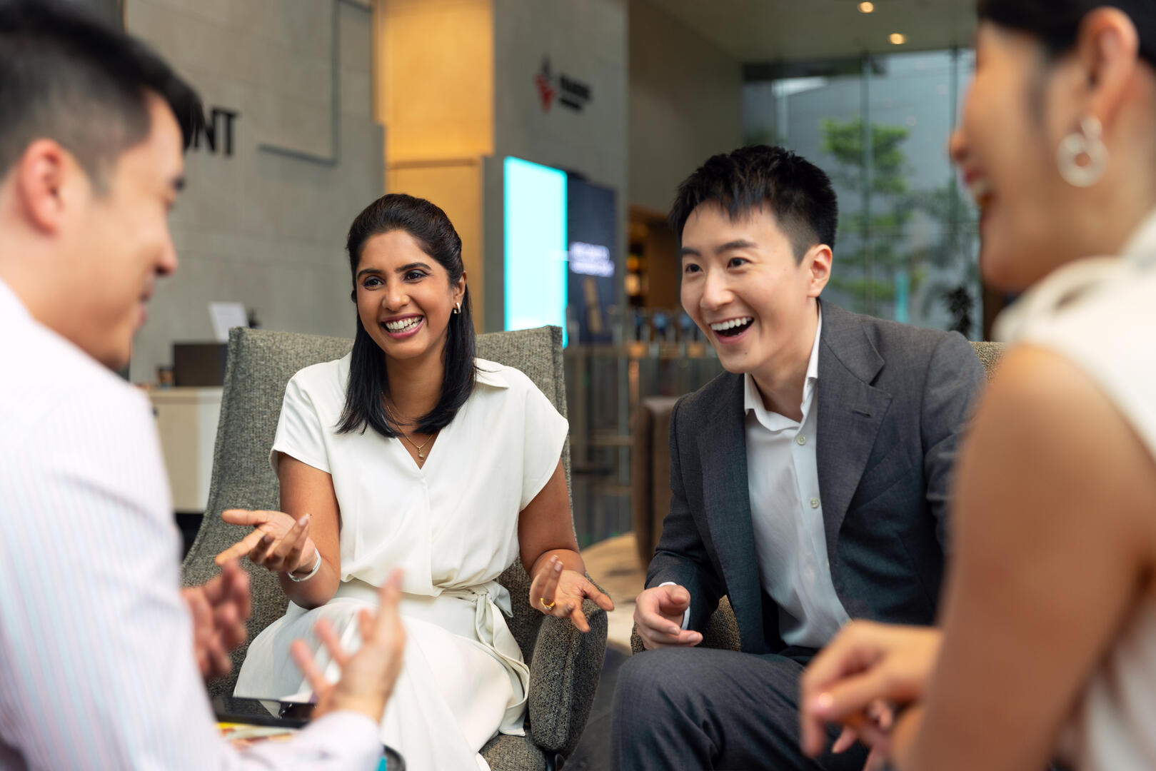 Frasers Property employees catching up with one another at our corporate headquarters, Alexandra Point Lobby