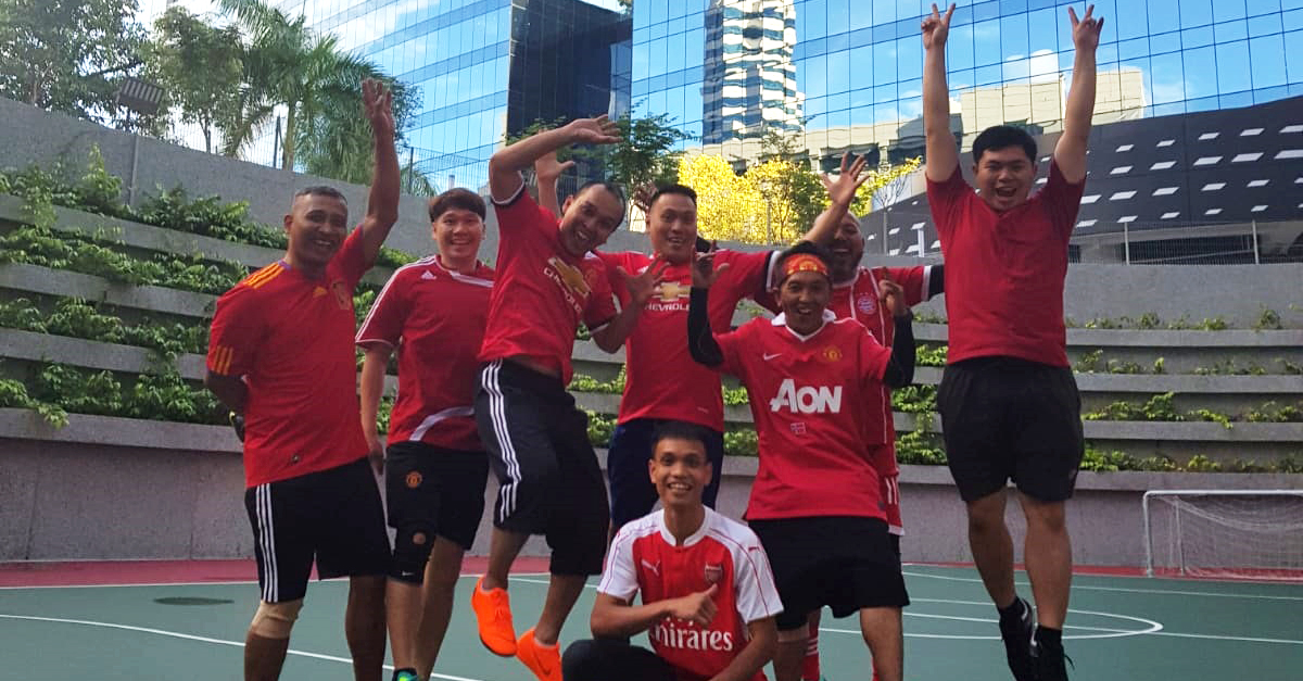 Azman and his futsal team