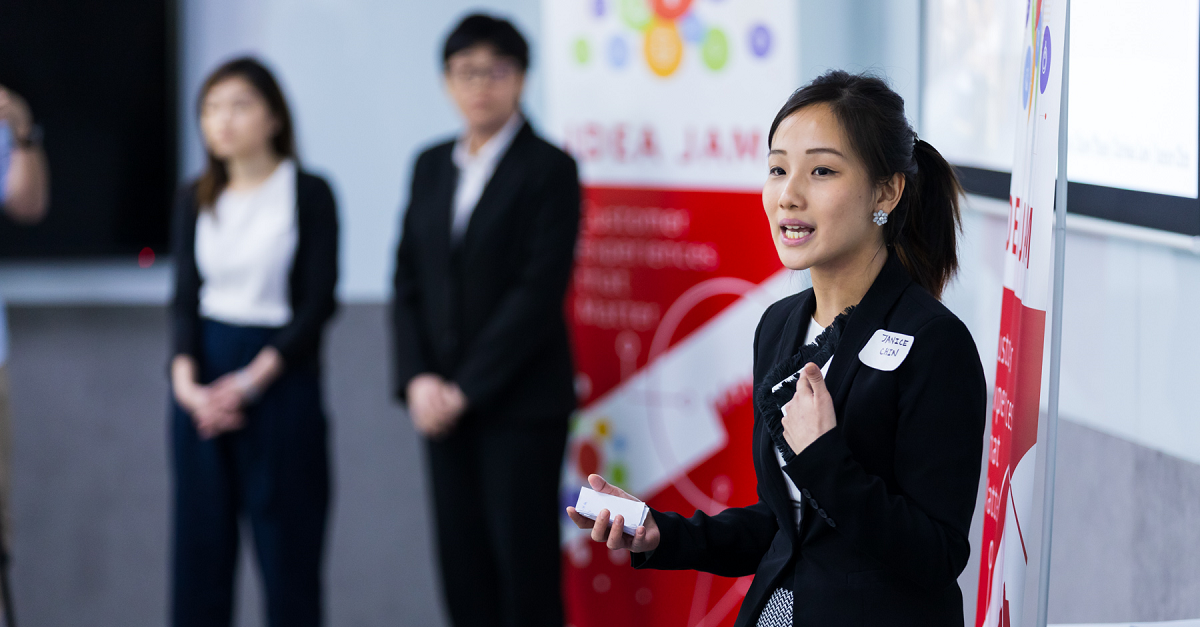 Undergraduates present their ideas to the panel of judges.