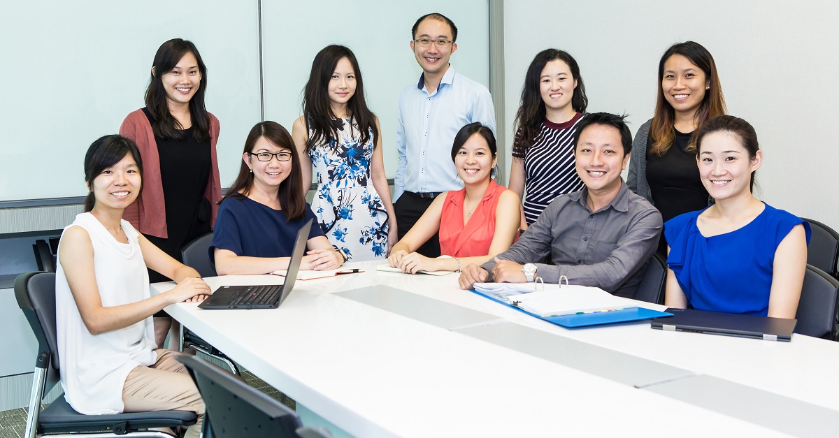 Chiu Shan (seated second from left) and her close-knit team.