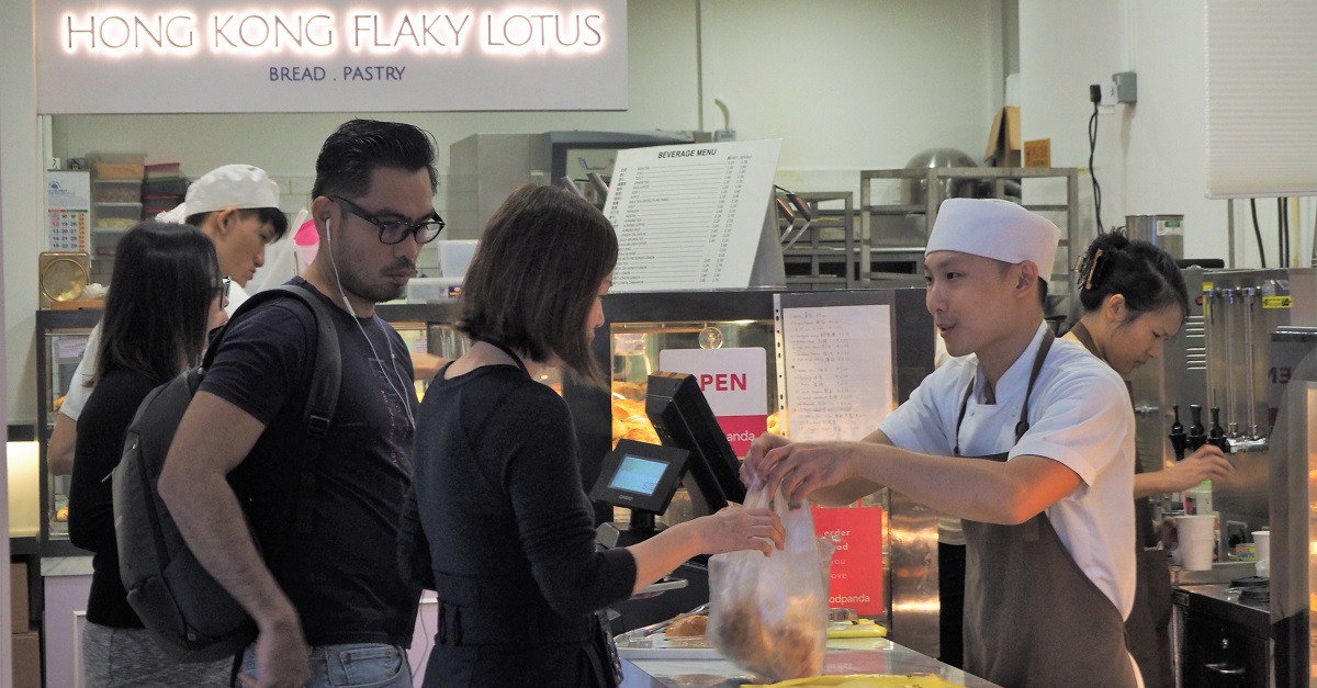 On most days, Ronald puts on multiple hats in the store, from baking buns and pastries to manning the cashier.