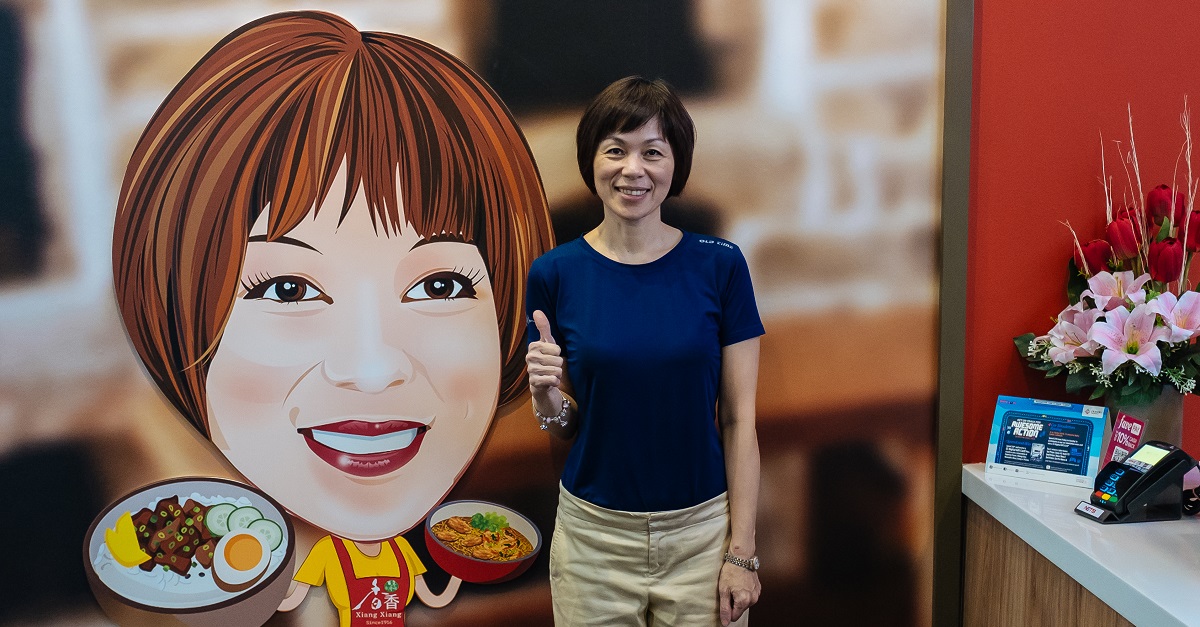 Customers are greeted with a caricature of Wendy at the entrance of the restaurant