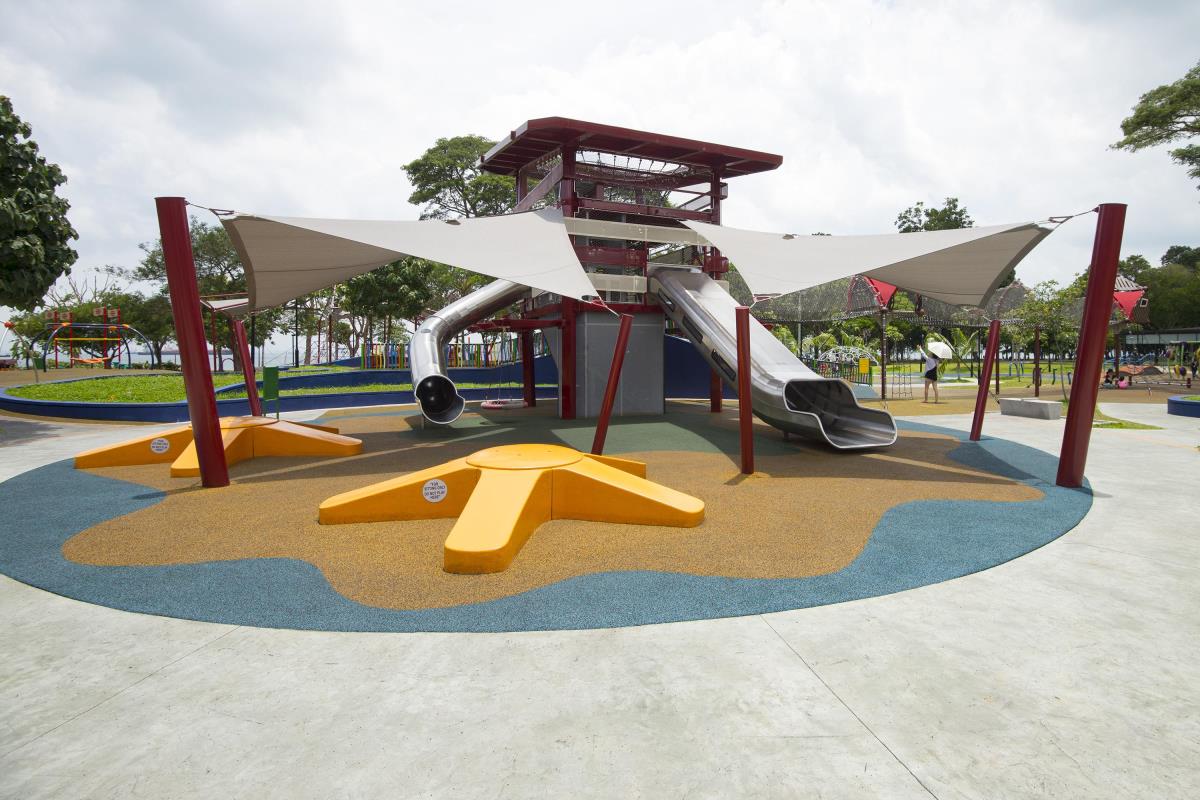 This massive tower at the Marine Cove Playground is modeled after a lighthouse which has three different levels of slides.