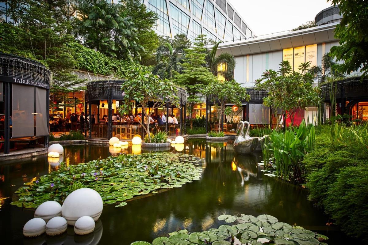 The Oasis, Changi City Point. Developed with a garden concept, the team worked with the mall’s tenants to incorporate more woody and rustic elements into the design of their spaces.