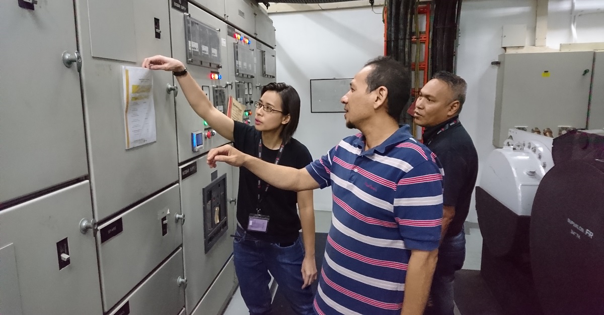 Ritav, on her rounds conducting an inspection at the Chiller Plant Room at Alexandra Point.