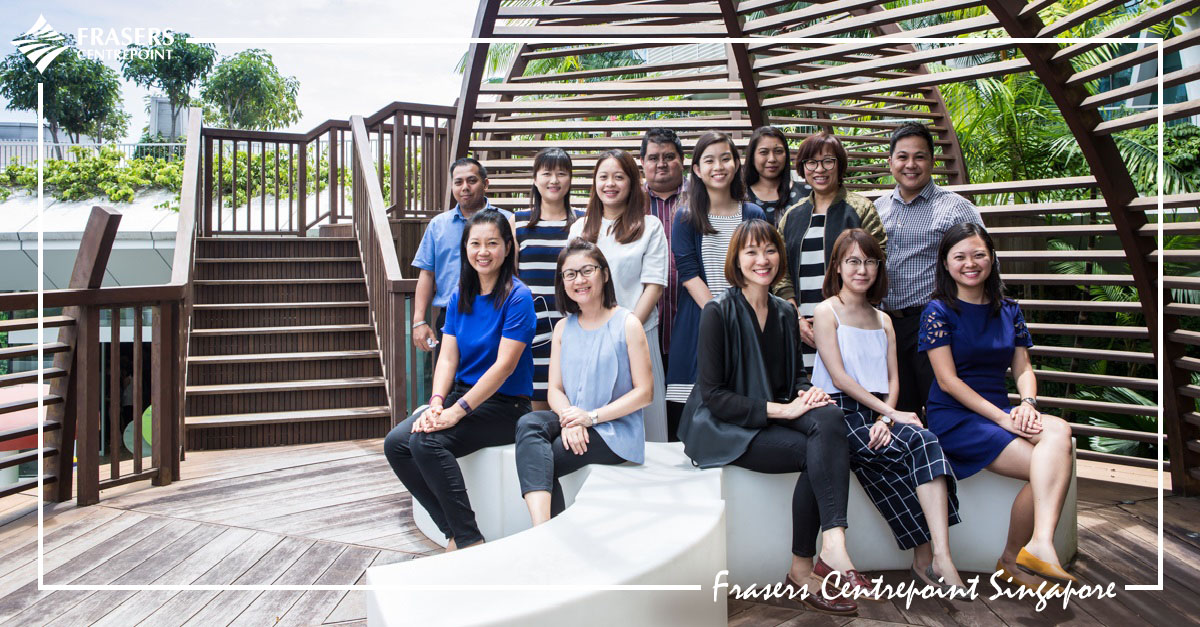 Jazmine Lim (seated third from left) with her team from Changi City Point.