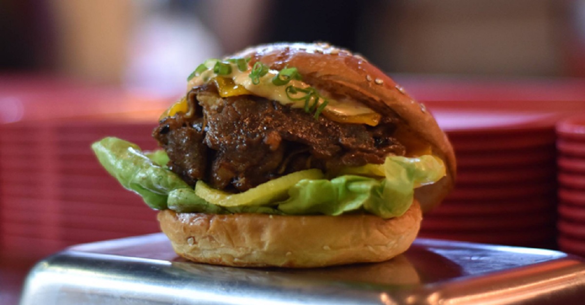  Wolf Burger’s “Burger for World Peace”, with Marinated Shabu Brisket, Kimchi Mayo, Korean Styled Pickled Radish combined with Caramelised Onions and American Sharp Cheddar in a gourmet Burger Bun.