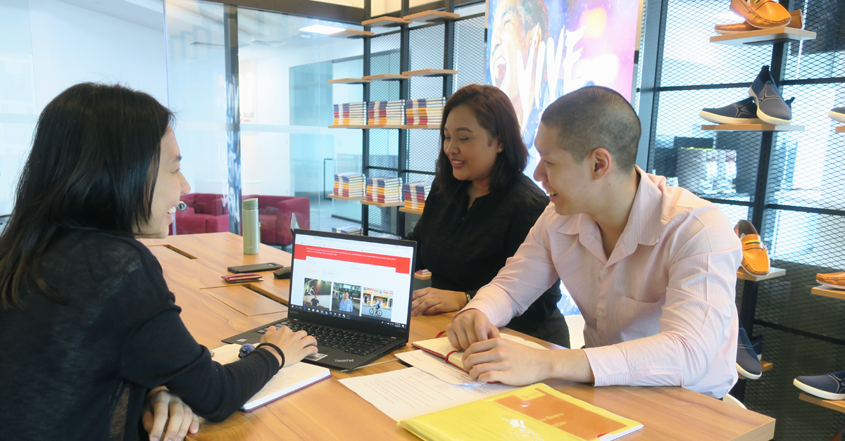 Chanon with Fara and Yee Ling, brainstorming marketing strategies