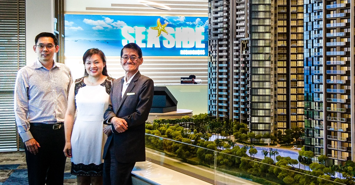 Elson (left), together with his staff Jenny Ho, Senior Marketing Manager, Sales & Marketing, Development & Property, Frasers Centrepoint Singapore (centre) and Jetro Teo, Showroom Officer, Sales & Marketing, Development & Property, Frasers Centrepoint Singapore (right), at the Seaside Residences show suite.