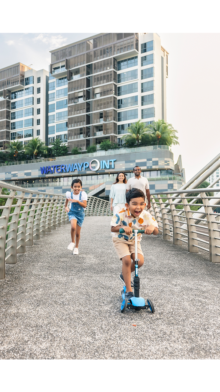 family at waterway point