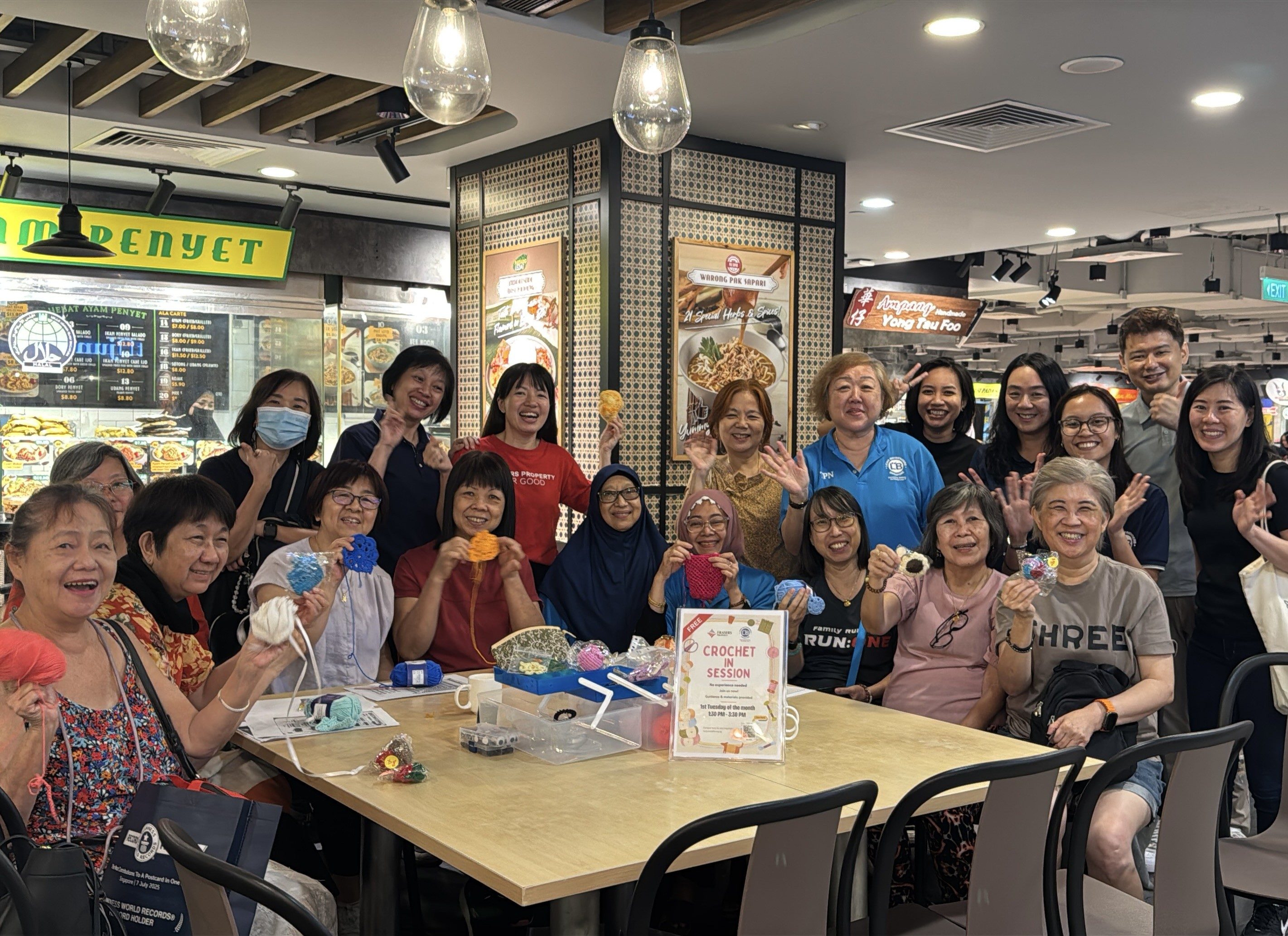 Seniors at our monthly ‘Crochet with Us’ session at Century Square 